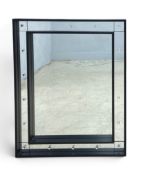 A large contemporary wall mirror in a glazed box show frame. H.100 x W.80cm.