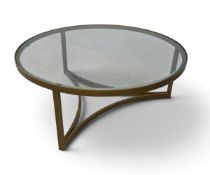 A contemporary circular coffee table, gilt metal and bevelled glass. H.40cm x Diameter. 100cm