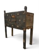 An early 20th century Indian livery dowry chest cabinet, profusely decorated with mirrors,