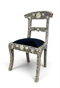 A bone inlaid Anglo Indian side or dining chair with bar back on sabre supports. H.90 x W.53 x D.