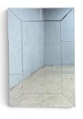 A very large contemporary wall mirror with bevelled plate in a glazed mirrored frame. H.150 x W.