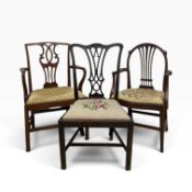 Three 19th century mahogany Chippendale revival dining chairs, each with fret carved backs on square