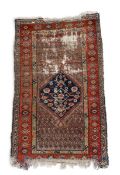 A Qashqai rug with central lozenge medallion on a stylised foliate field within multiple borders.