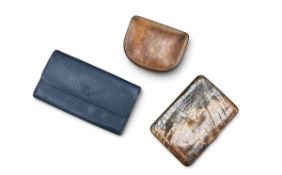 A collection of early 20th century leather wallets, purses and a jewellery box including a large