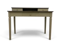 A contemporary desk or dressing table fitted with drawers to the superstructure and a frieze