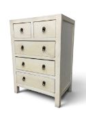 A contemporary chest of drawers of compact size in a matt finish. H.85 x W.60 x D.40cm.