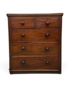 A Victorian mahogany chest of two short over three long drawers fitted with knob handles. H.110 x