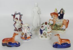 Five 19th century and later Staffordshire figures together with a Parianware figure of Beethoven and