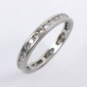 White metal diamond full eternity ring. Size L 1/2 2.57 mm. 2.3 grams.