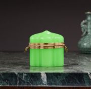 AN EARLY 20TH CENTURY FRENCH URANIUM GLASS CASKET