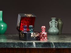 A 19TH CENTURY MOTHER OF PEARL DECANTER BOX WITH COLOURED DECANTERS