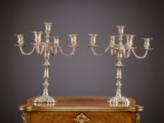 A PAIR OF GEORGE III STYLE SILVER PLATED CANDELABRA