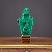 A CHINESE CARVED MALACHITE URN AND COVER