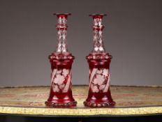A PAIR OF 19TH CENTURY BOHEMIAN FLASHED AND ETCHED RUBY GLASS DECANTERS