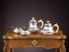 A GEORGE V PERIOD STERLING SILVER TEA SET C. 1918. GARRARD & CO.