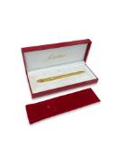 CARTIER: A GOLD PLATED PEN IN DISPLAY BOX