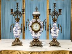 A LARGE JAPY FRERES GLAZED CERAMIC AND GILT METAL MOUNTED CLOCK GARNITURE