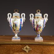 A PAIR OF 19TH CENTURY DRESDEN PORCELAIN VASES AND COVERS