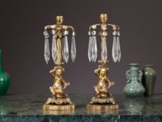 A PAIR OF REGENCY GILT BRONZE FIGURAL LUSTRE CANDLESTICKS