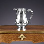 GARRARD & CO.: A STERLING SILVER WATER PITCHER