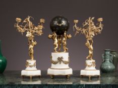 A 19TH CENTURY FRENCH GILT BRONZE AND MARBLE GLOBE CLOCK GARNITURE