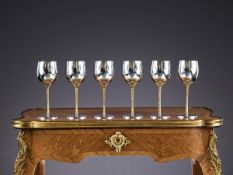 STUART DEVLIN: A SET OF SIX STERLING SILVER AND SILVER GILT MODERNIST WINE GOBLETS