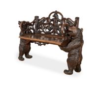 A RARE 19TH CENTURY BLACK FOREST CARVED WOOD BEAR BENCH