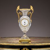 A FINE 19TH CENTURY EMPIRE STYLE CUT GLASS AND ORMOLU VASE CLOCK IN THE STYLE OF BACCARAT