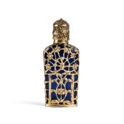 A MID 18TH CENTURY ENGLISH GOLD AND GLASS SCENT BOTTLE C. 1750