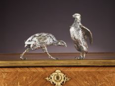 A PAIR OF DUTCH SILVER AND SILVER GILT MODELS OF QUAILS