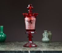 A FINE MID 19TH CENTURY BOHEMIAN RUBY STAINED AND ENGRAVED GLASS VASE AND COVER