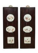 A LARGE PAIR OF CHINESE QING DYNASTY PANELS WITH PORCELAIN INSERTS