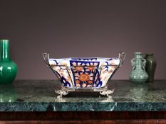 A LARGE JAPANESE MEIJI PERIOD IMARI BOWL ON SILVER PLATED STAND
