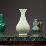 A CHINESE QING DYNASTY CELADON PORCELAIN DRAGON VASE