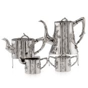 AN EARLY 20TH CENTURY CHINESE EXPORT SOLID SILVER FOUR PIECE TEA SET, PAOSING, C. 1900