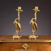 A PAIR OF 19TH CENTURY ORMOLU CANDLESTICKS AFTER THOMAS ABBOT