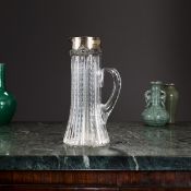 AN EARLY 20TH CENTURY AMERICAN STERLING SILVER MOUNTED GLASS JUG