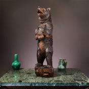 A LARGE 19TH CENTURY BLACK FOREST CARVED WOOD STANDING BEAR