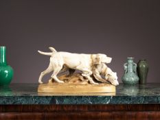 A LARGE ROYAL DUX PORCELAIN MODEL OF A HOUND WITH GAME