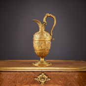A 19TH CENTURY ORMOLU CELLINI EWER