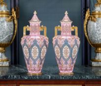 A PAIR OF 19TH CENTURY PORCELAIN URNS BY ROYAL CROWN DERBY FOR THE ISLAMIC MARKET