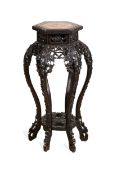 A 19TH CENTURY CHINESE CARVED HARDWOOD AND MARBLE STAND