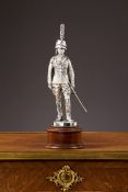 A STERLING SILVER FIGURE OF A ROYAL HASSARS SOLDIER, LONDON, 1978
