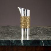 STUART DEVLIN: A STERLING SILVER AND PARCEL GILT MODERNIST JUG C. 1979