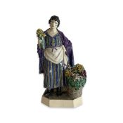 A CHELSEA POTTERY FIGURE 'THE DAFFODIL SELLER' DESIGNED BY CHARLES VYSE, 1925