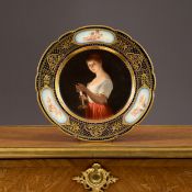 A LATE 19TH CENTURY VIENNA STYLE PORCELAIN CABINET PLATE 'GOOD NIGHT'
