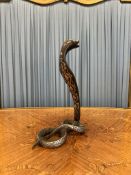 AN INDIAN BRONZE AND SILVERED MODEL OF A COBRA
