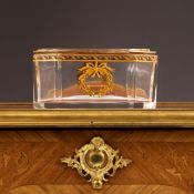 A 19TH CENTURY FRENCH GILDED GLASS JEWELLERY CASKET