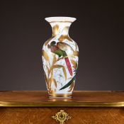 BACCARAT (ATTRIBUTED TO): A 19TH CENTURY OPALINE GLASS AND PAINTED VASE WITH PARROTS