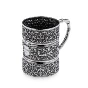 A 19TH CENTURY INDIAN SOLID SILVER MUG, OOMERSI MAWJI, BHUJ, C. 1890
